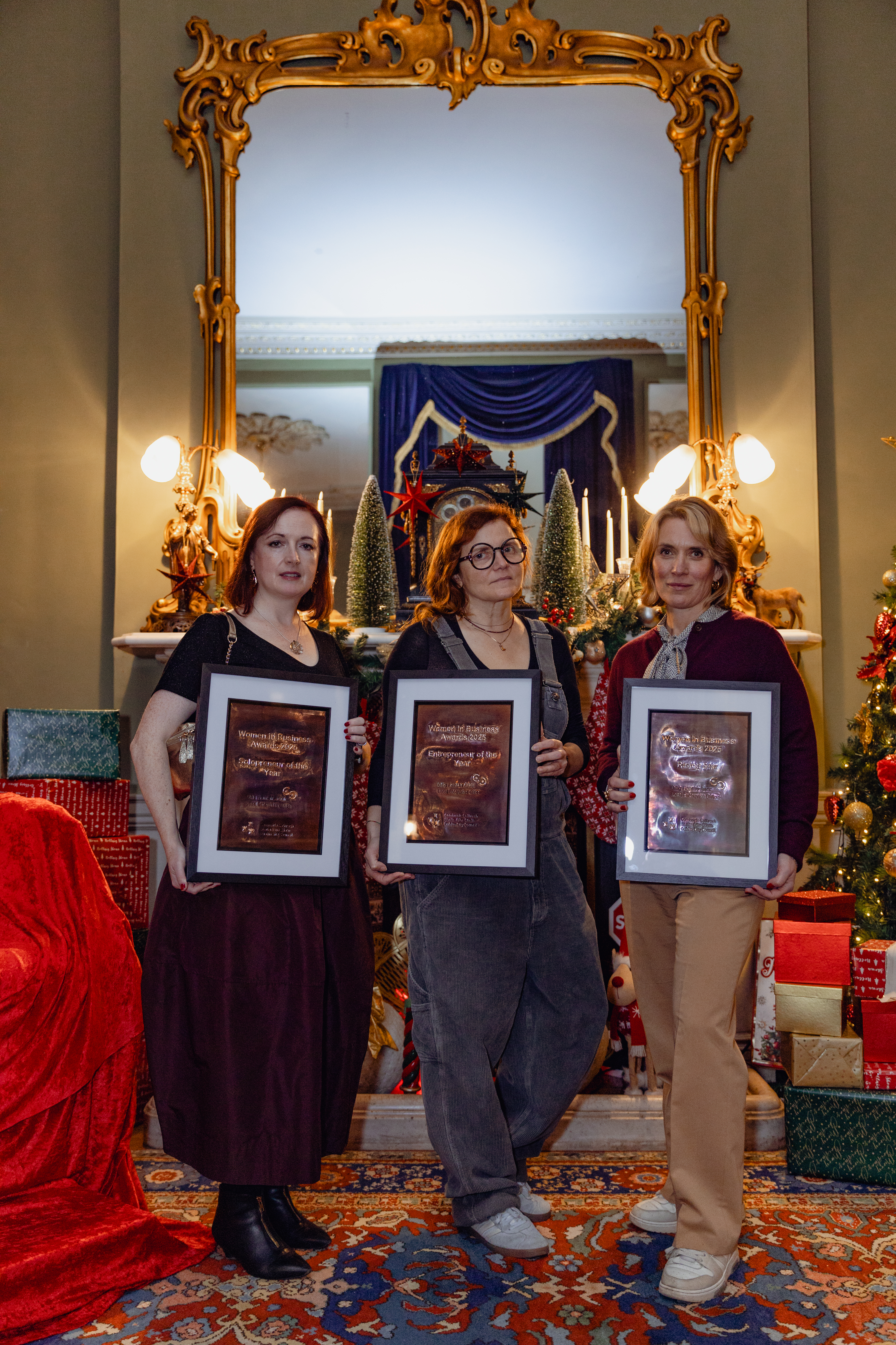 Award Winners in front of tree 2025